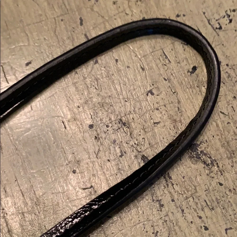 𝅺COACH Poppy Black & Gold Patent Leather Wristlet